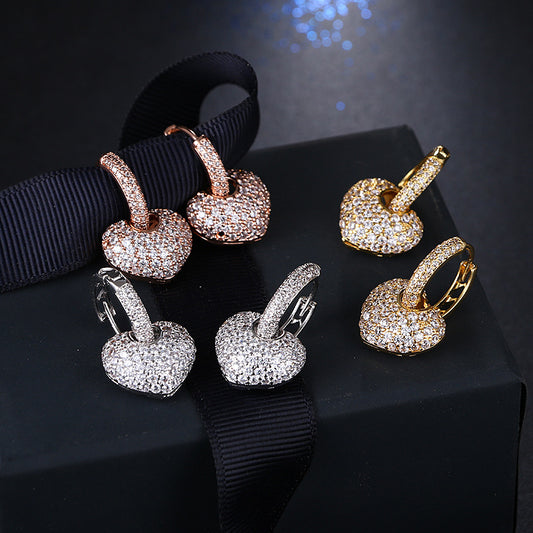 Micro-set zircon peach heart ear clip earrings