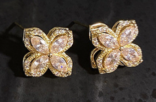 Rotating Four Petal Flower Pendant Necklace