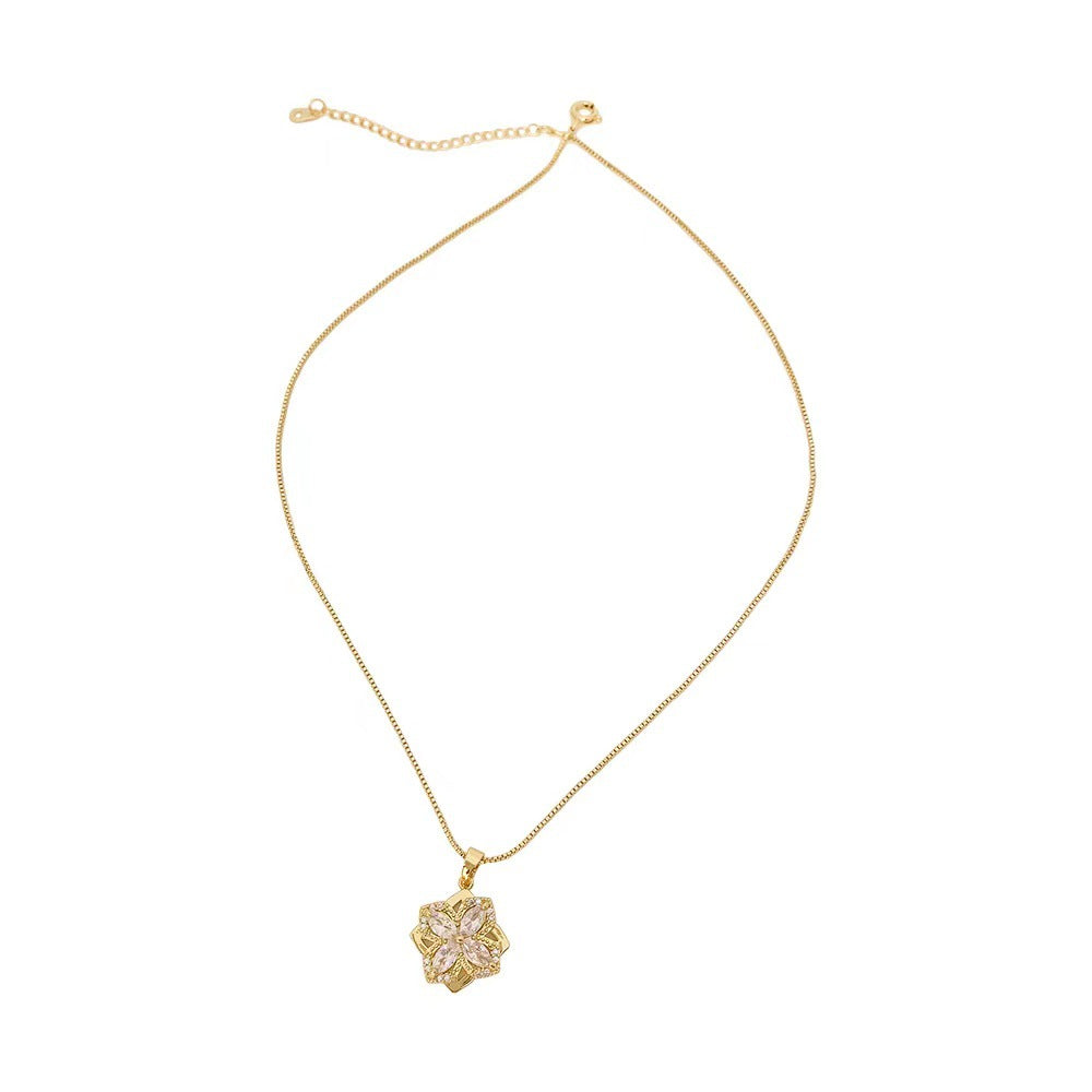 Rotating Four Petal Flower Pendant Necklace
